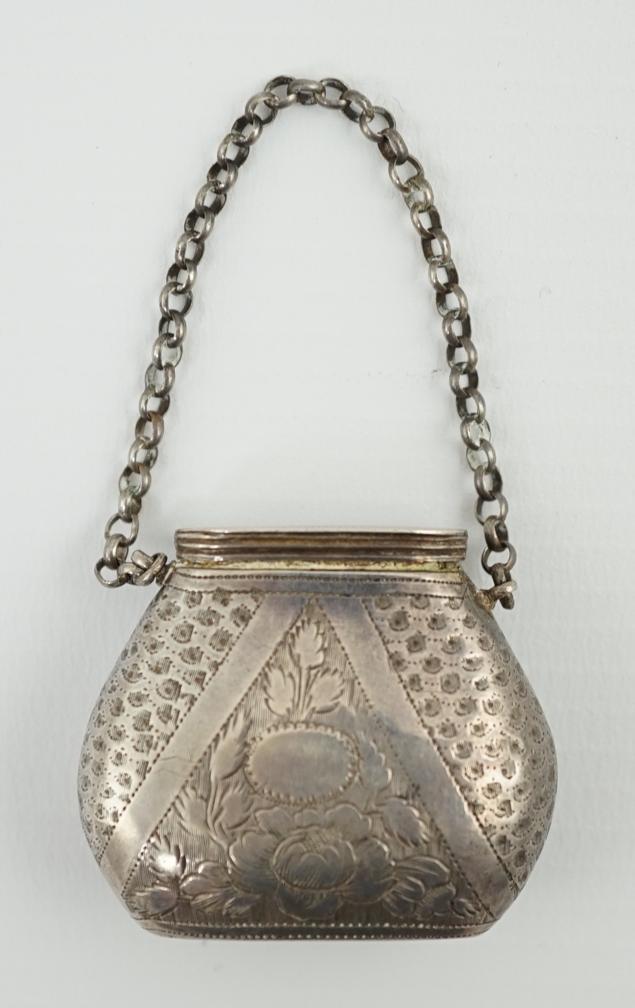 A late George III silver novelty vinaigrette, modelled as a basket/purse, by Samuel Pemberton